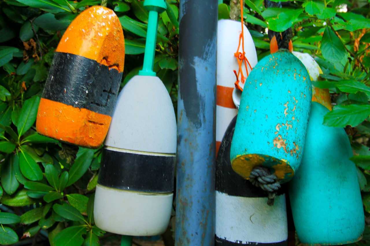 buoys on a lamp post close